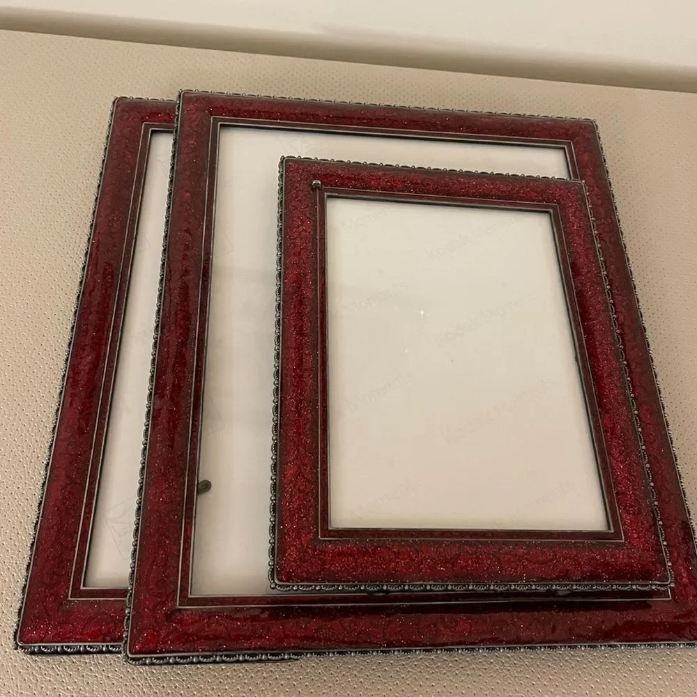 Three burgundy frames